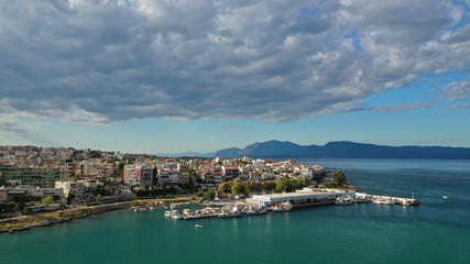 Naklejka na ściany i meble Aerial photo of famous seaside town of Halkida with beautiful clouds and deep blue sky, Evia island, Greece