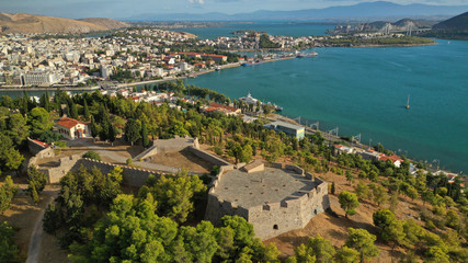 Fototapeta na wymiar Aerial drone photo of famous castle of Karampampa built on top of hill in seaside town of Halkida or Chalkida, Evia island, Greece