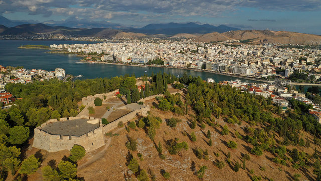 Aerial drone photo of famous castle of Karampampa built on top of hill in seaside town of Halkida or Chalkida, Evia island, Greece