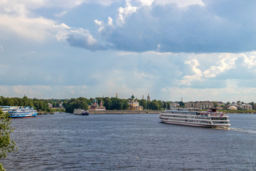 Fototapeta premium Uglich. Yaroslavl region. View of the Uglich Kremlin and the Volga river. The Church of St. Dimitry on the blood, Transfiguration Cathedral. Cruise ships berthed