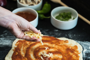 making homemade Italian-style pizza