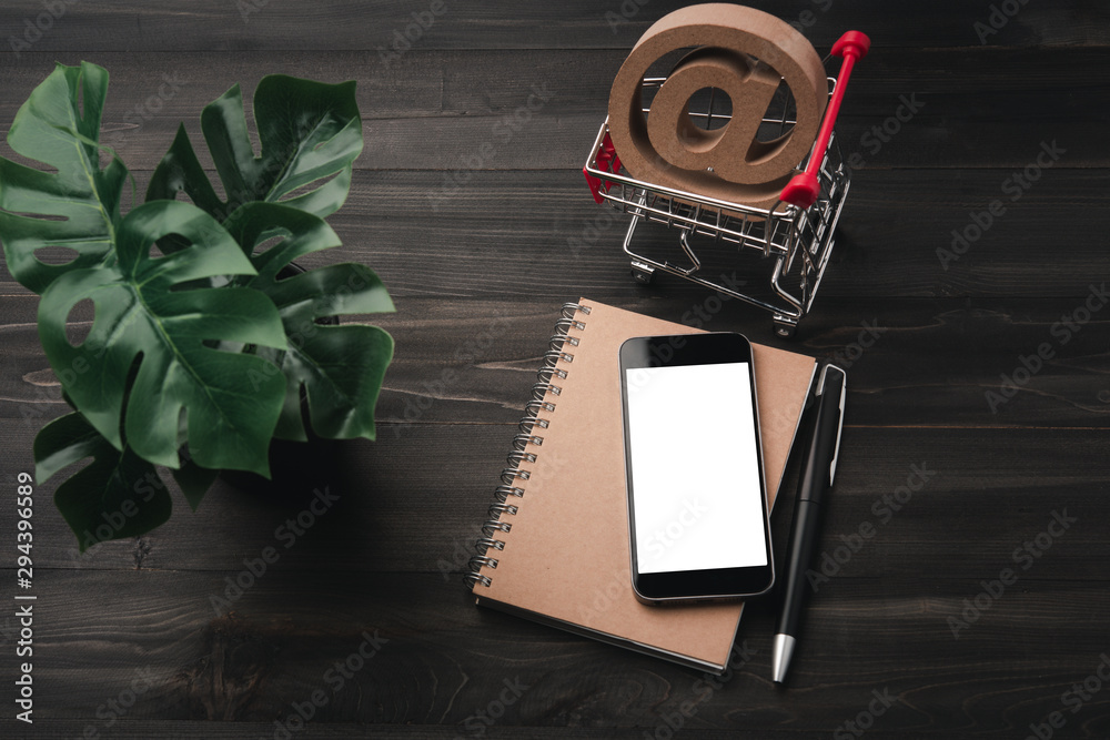 Poster creative workspace modern dark office desk with blank smartphone and pen on notebook,mockup topview