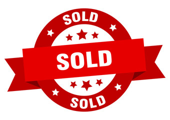 sold ribbon. sold round red sign. sold