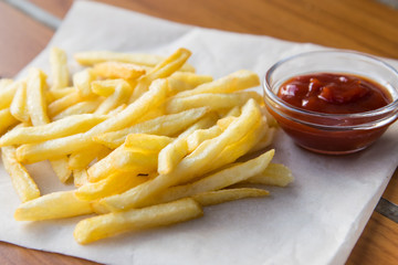 close-up, French fries with ketchup on the table