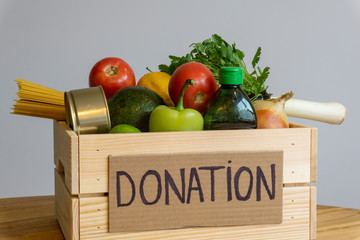 Food donation concept. Donation box with vegetables, fruits and other food for donation