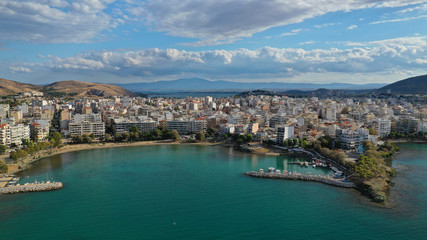 Naklejka na ściany i meble Aerial photo of famous seaside town of Halkida with beautiful clouds and deep blue sky, Evia island, Greece