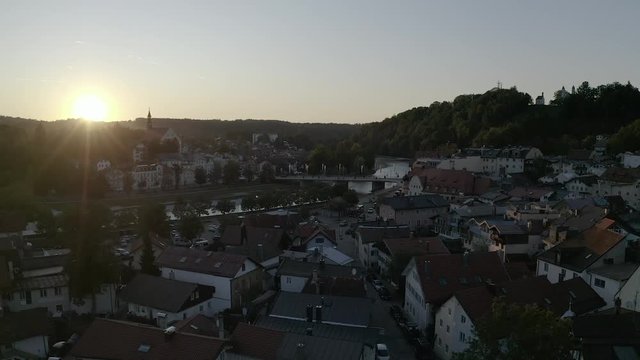 Aerial Flight Bad T&ouml;lz Bavaria Germany. Sunset Drone Shot. Isar River and the old town in the back