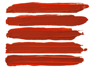 Obraz premium Red lipstick smudged isolated on white with copy space for background