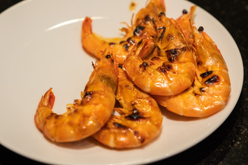 Grilled prawns on charcoal stove