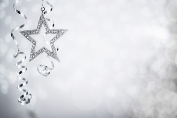 Silver Christmas star and ribbon