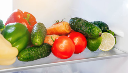 Open fridge. Healthy food. Vegetables and fruits