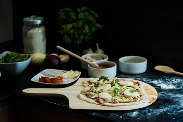 making homemade Italian-style pizza