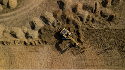 Top view of excavator on construction site