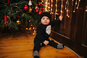 Happy fun child paying at home on Christmas time. Xmas holiday concept