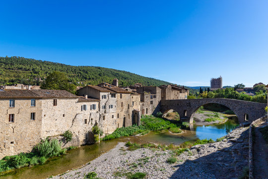 Perspective of the Romanesque bridge, was built in the 12th century. Lagrasse, Occitanie, France.