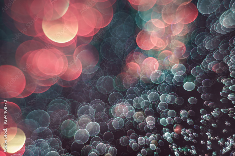 Poster beautiful light bokeh on a red white and darkness background.