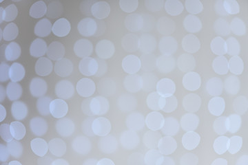 Beautiful and soft blurry bokeh background from blue garland.