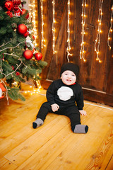 Happy fun child paying at home on Christmas time. Xmas holiday concept