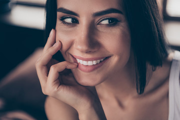 Fototapeta premium Cropped close-up portrait of her she nice-looking attractive lovely charming cute winsome pretty cheerful girl touching face in house flat apartment indoors