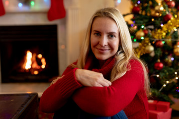 Woman at home at Christmas time