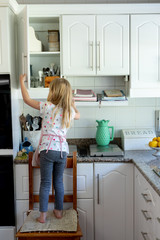 Girl making Christmas cookies at home