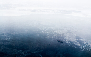 Frozen ship in the Kamchatka harbor 