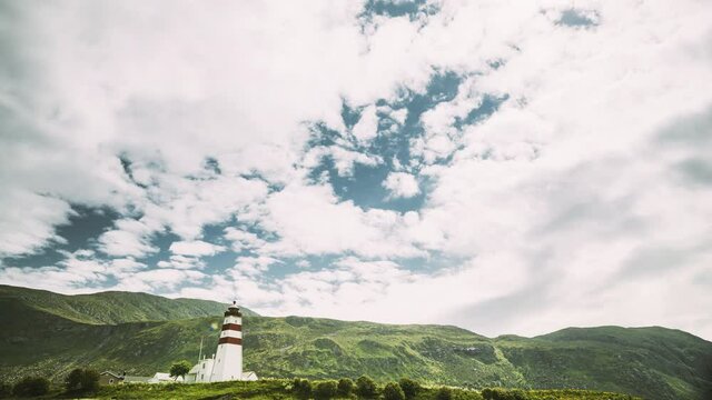 Alnesgard, Godoya, Norway. Old Alnes Lighthouse In Summer Day In Godoy Island Near Alesund Town. Alnes Fyr