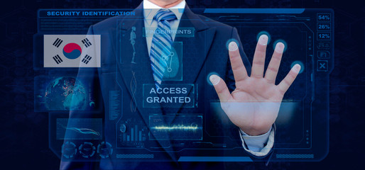 Finger Print Biometric Scanning Identification System. Businessman scan fingerprint biometric identity and approval. South Korea Nationality
