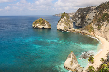 Panorama view of diamond beach in Nusa Penida Island. Bali, Indonesia. Landscape view of diamond beach with rocky and turquoise sea. diamond beach is tourist attraction. Travel concept