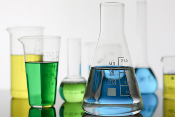 Chemical industry bulb with blue magenta test tube background