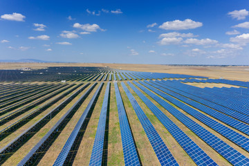 Aerial view of many panels of solar cells.