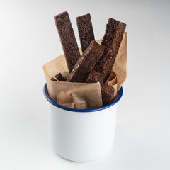 Rye bread deep fried crunchy sticks with sea salt isolated on white background