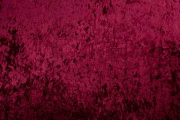 The fabric is a red velvet background texture