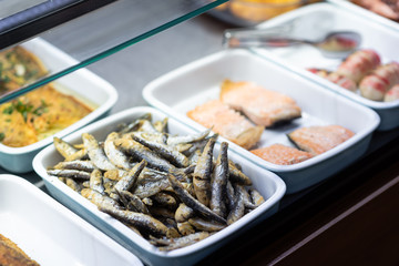 Prepared fish and seafood in shelf of restaurant 