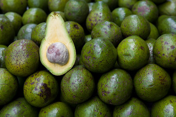 Avocado heap on stall at open market