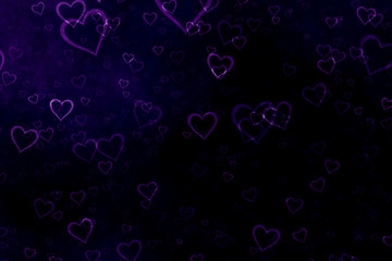 Purple hearts on black background. Valentine's Day abstract background with hearts