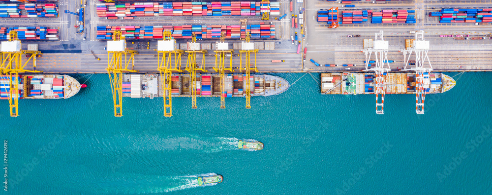 Fototapete Top view of Deep water port with cargo ship and containers. It is an import and export cargo port where is a part of shipping dock and export products worldwide