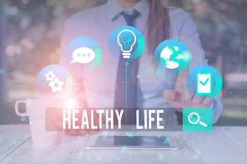 Handwriting text writing Healthy Life. Conceptual photo one that helps to keep and improve showing...