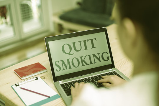 Handwriting text Quit Smoking. Conceptual photo process of discontinuing tobacco smoking or cessation woman laptop computer office supplies technological devices inside home