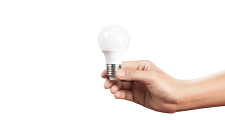 Hand of holding illuminated light bulb, innovation inspiration concept