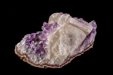 macro mineral amethyst stone with calcite black background