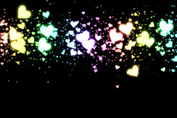 Gradient hearts on black background. Valentine's Day abstract background with hearts