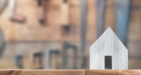 Wooden House Model on wooden there space.Home,Housing Real Estate concept