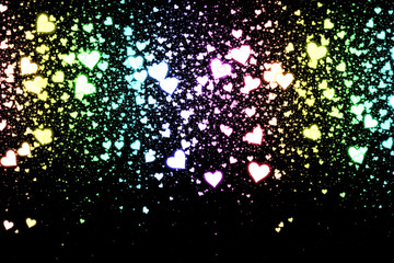 Gradient hearts on black background. Valentine's Day abstract background with hearts