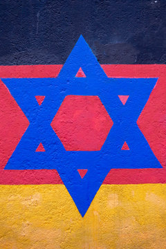 jewish symbol painted over german flag