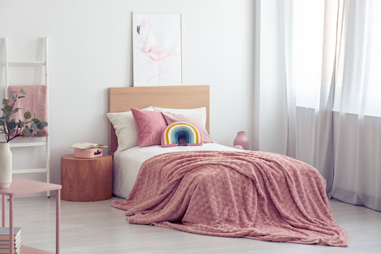 White and pastel pink scandinavian bedroom interior for kid