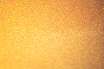 Defocused lights  blurred abstract gold color background