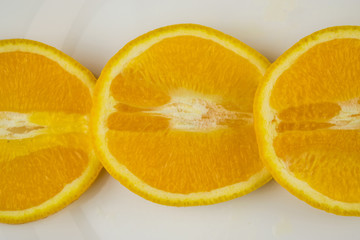 Slice of orange on a white background. Isolated.