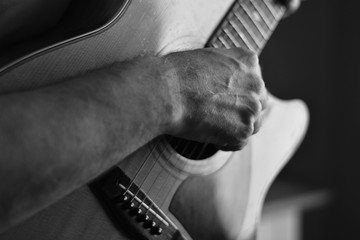 hand with guitar