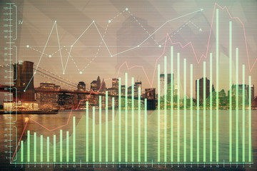 Financial graph on night city scape with tall buildings background multi exposure. Analysis concept.